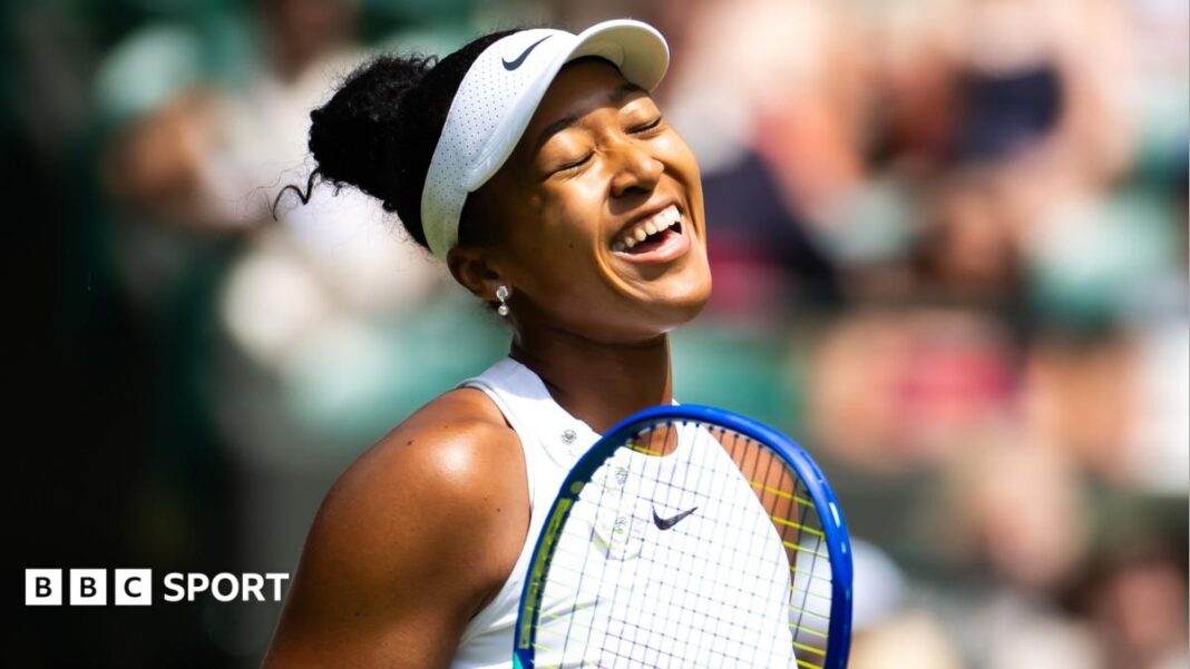 Rezultati Wimbledona 2026.: Naomi Osaka potaknuta maminim kuhanjem u pobjedi nad Arynom Sabalenkom Naomi Osaka warms up for her match against Aryna Sabalenka at Wimbledon